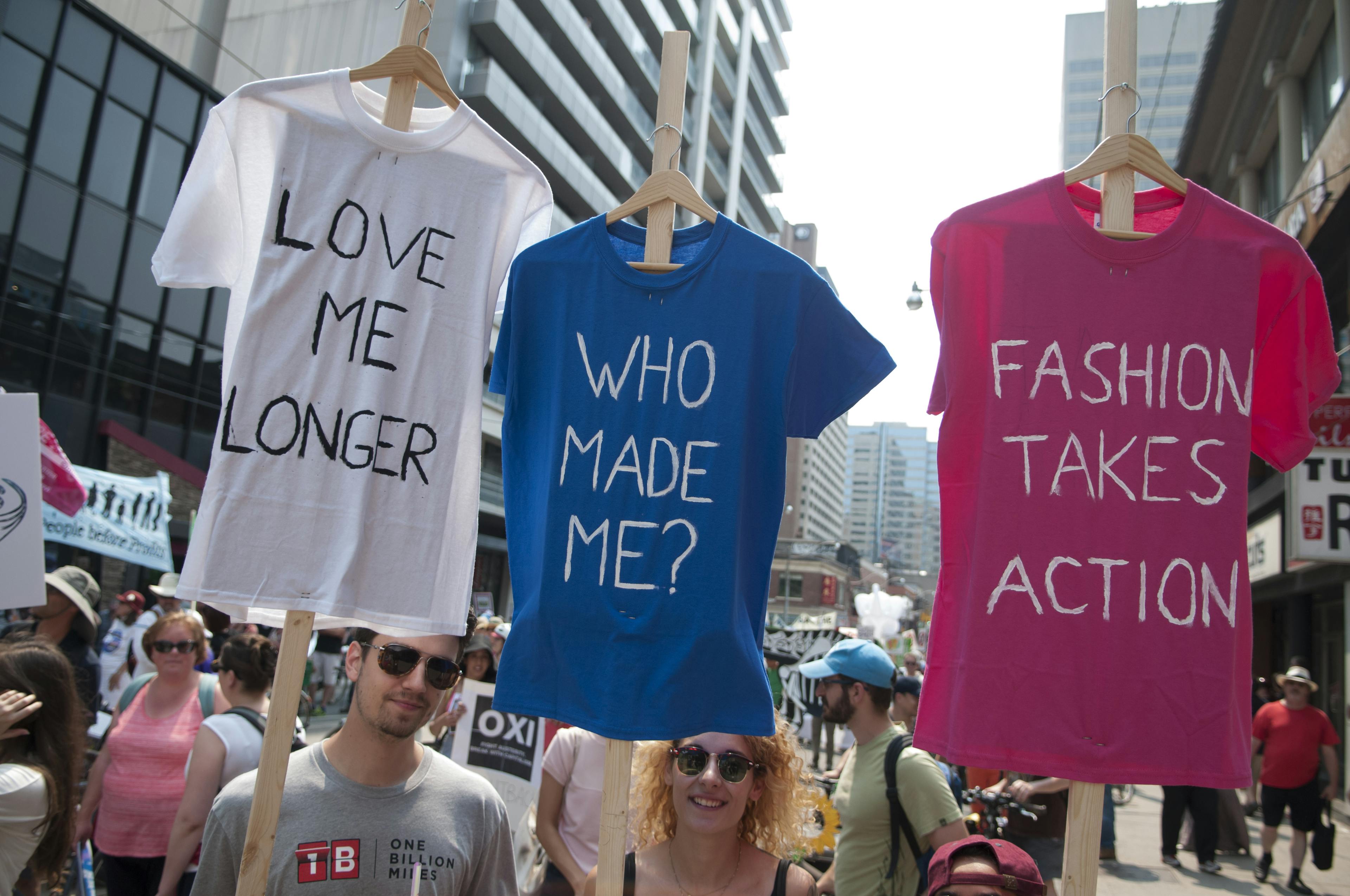 people protesting against the fashion industry's effect on the environment 