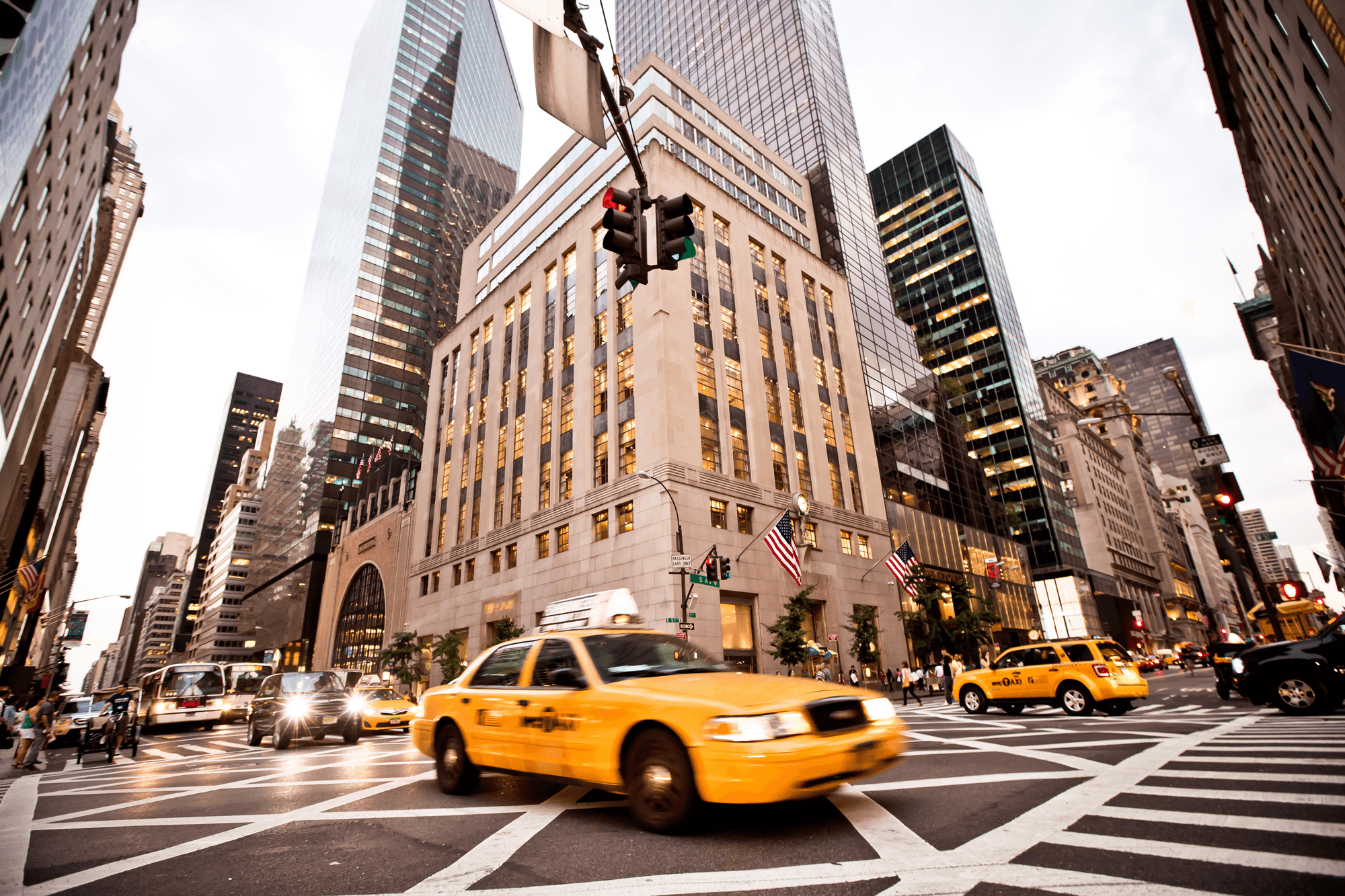 view of manhattan, new york, with yellow taxi cab blurred