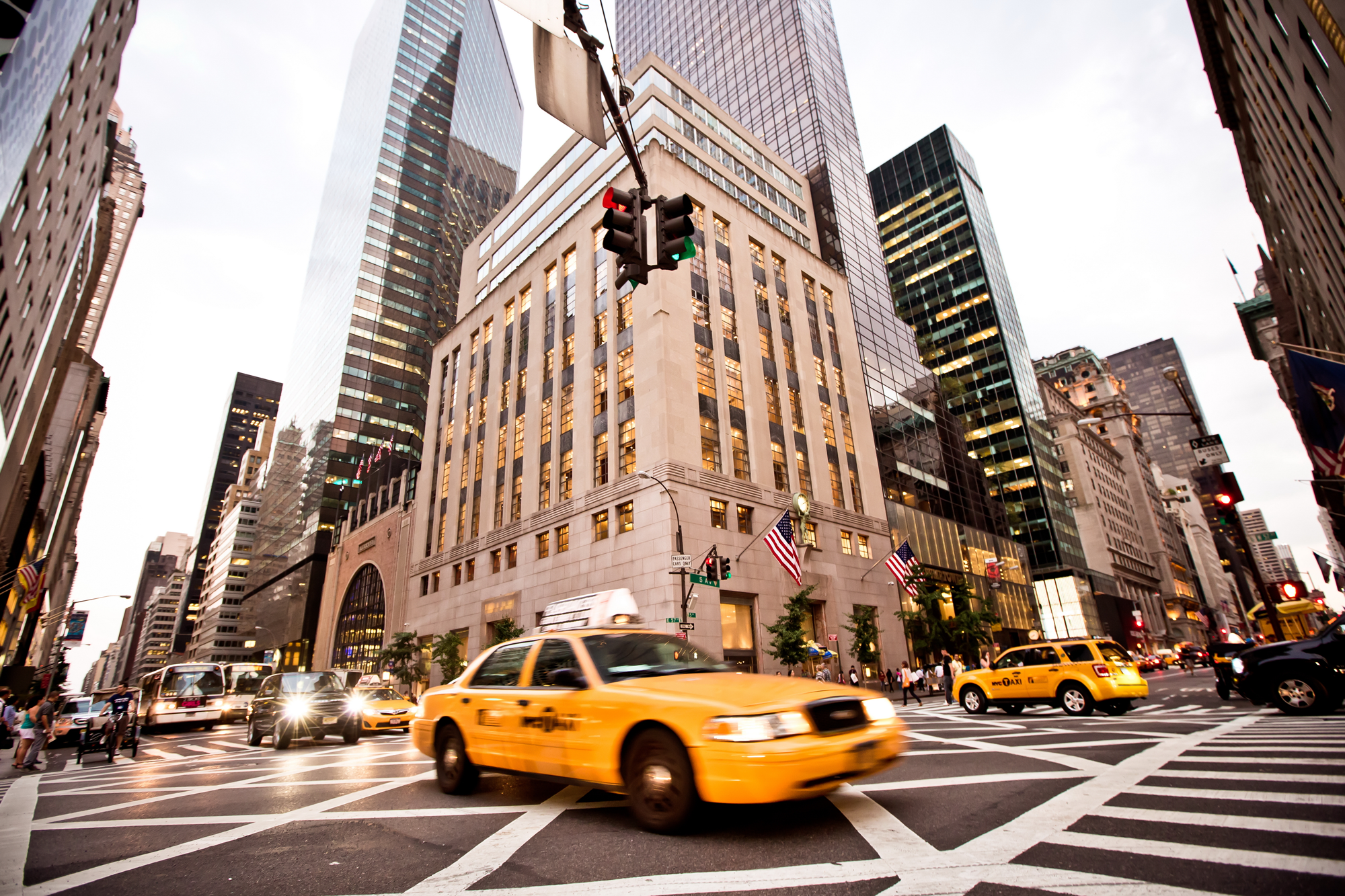 yellow taxi cab on new york city street 