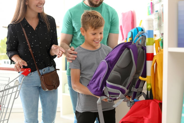 family in store doing back-to-school shopping